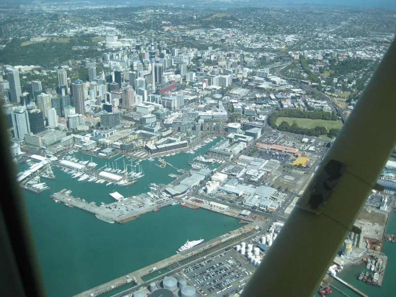 Auckland CBD with Sky Tower and Viaduct Basin · Jim and LInda · Mar 10