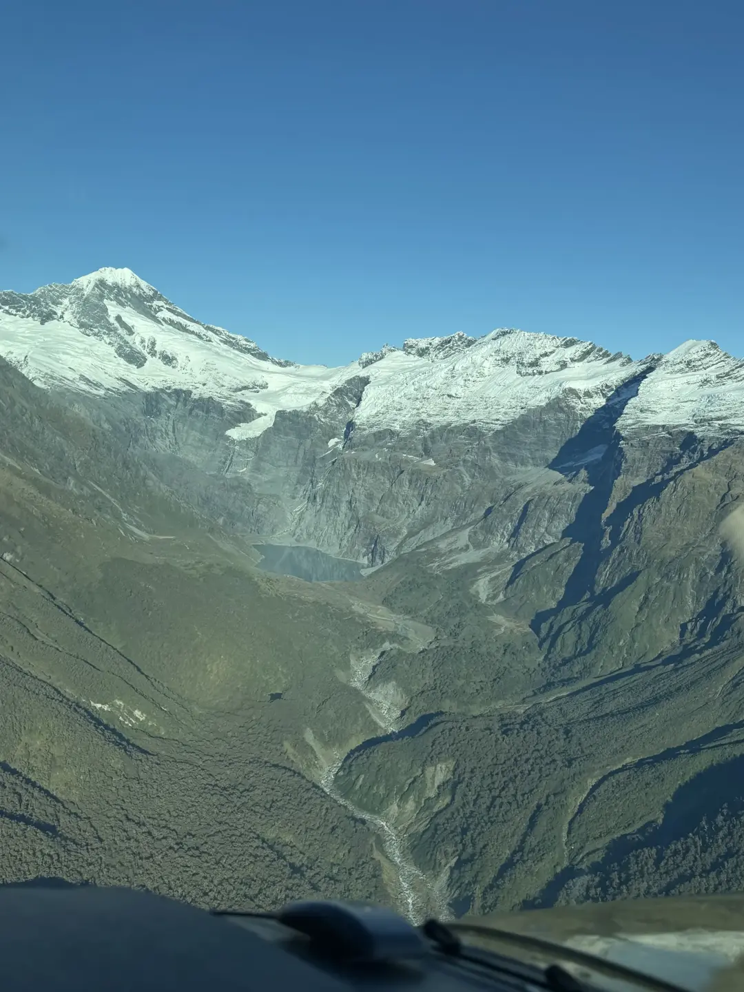 Glacier lake and snowfields in the Southern Alps