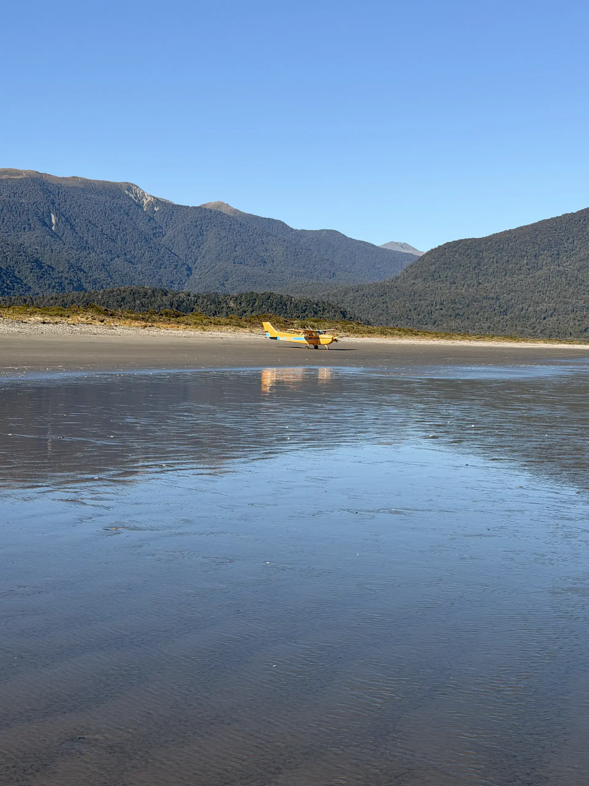 Flyinn Cessna 172 on the beach at Big Bay