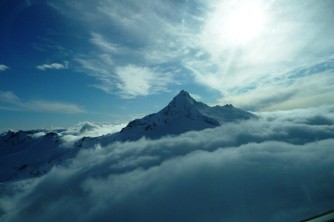 Mount Aspiring rising above the cloud2. Michael and Lesley. UK. October 2011