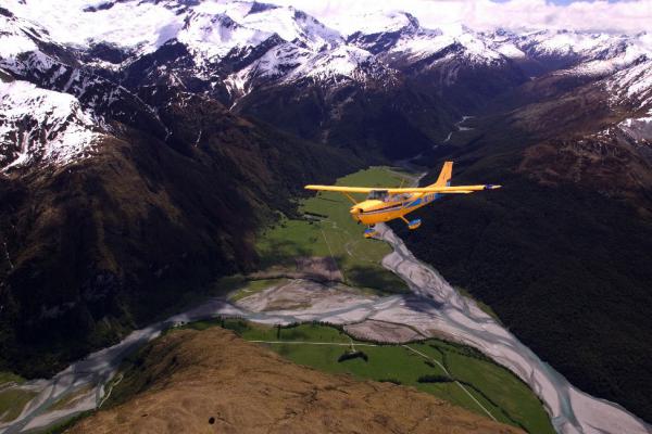 Cessna over NZ mountains